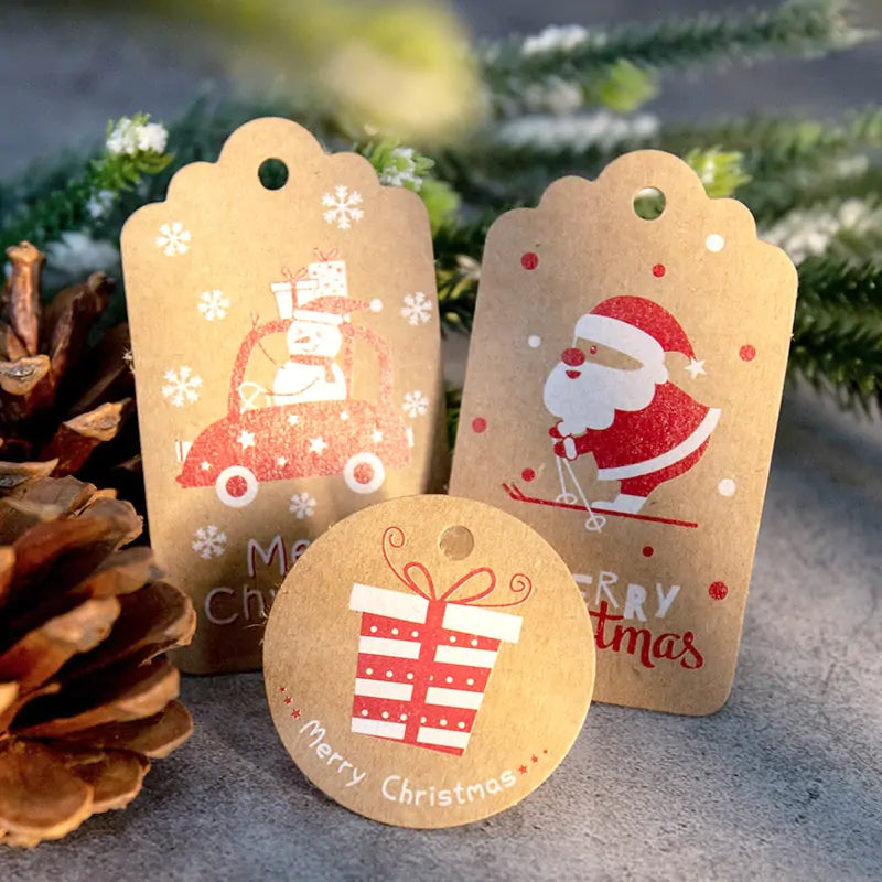 Close-up of Velaflare Christmas gift tags showing detailed prints and smooth kraft paper texture for writing names.