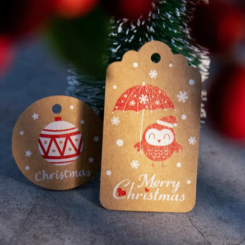 Velaflare Christmas kraft tags arranged flat to show multiple patterns and festive red and white prints.