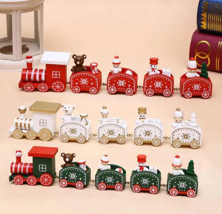 Complete set of red, green, and white wooden Christmas train ornaments displayed together.
